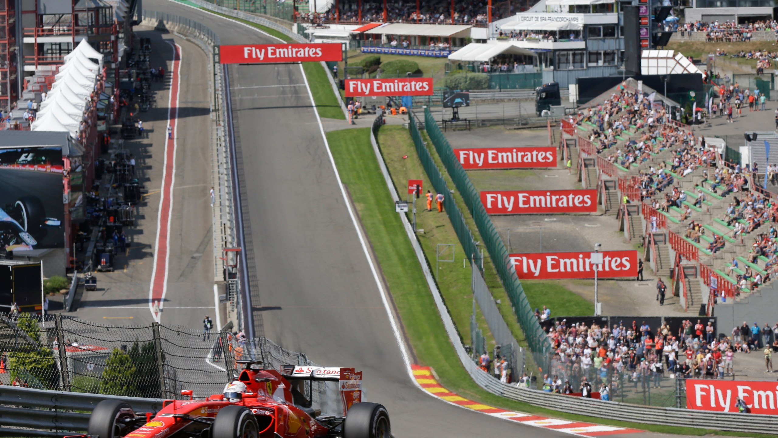 FILE - Ferrari driver Sebastian Vettel of Germany steers his car during the second free practice at the Spa-Francorchamps circuit, Belgium, on Aug. 21, 2015. (AP Photo/Luca Bruno, File)