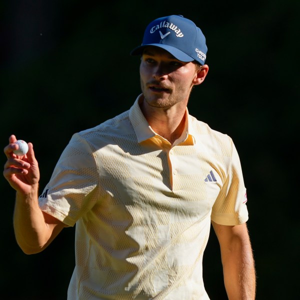 FILE - Nicolai Hojgaard, of Denmark, waves after making a putt on the 13th hole during final round at the Masters golf tournament at Augusta National Golf Club Sunday, April 14, 2024, in Augusta, Ga. (AP Photo/Matt Slocum, File)