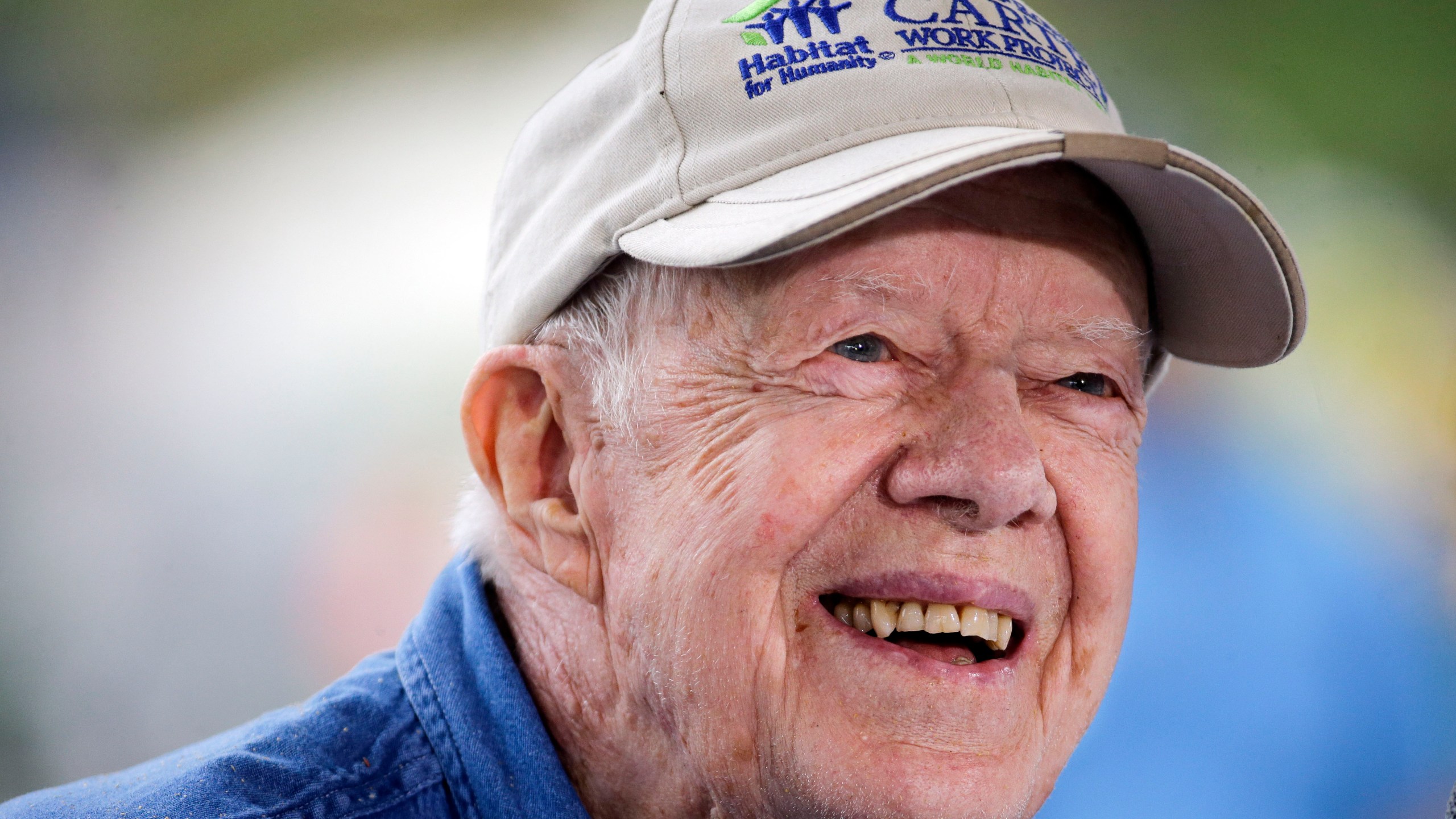 FILE - Former President Jimmy Carter answers questions during a news conference at a Habitat for Humanity building site, in Memphis, Tenn., on Nov. 2, 2015. (AP Photo/Mark Humphrey, File)