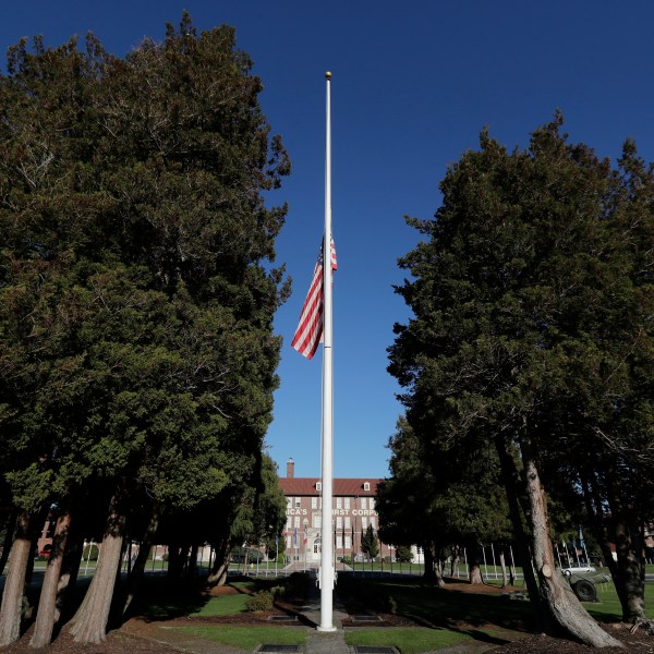 FILE - The main flag pole in front of the U.S. Army I Corps headquarters on Joint Base Lewis-McChord, south of Tacoma, Wash., hangs at half-staff, Wednesday, Dec. 5, 2018. (AP Photo/Ted S. Warren, File)