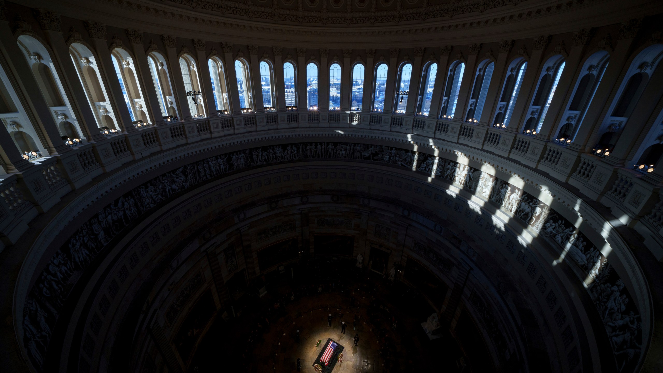 The flag-draped casket of former President Jimmy Carter lies in state at the rotunda of the U.S. Capitol, Wednesday, Jan. 8, 2025, in Washington. (Andrew Harnik/Pool via AP)