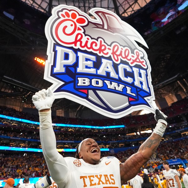 Texas linebacker Morice Blackwell Jr. (37) celebrates victory after a quarterfinals College Football Playoff game against Arizona State, Wednesday, Jan. 1, 2025, in Atlanta. Texas won 39-31 in two overtime periods. (AP Photo/Brynn Anderson)