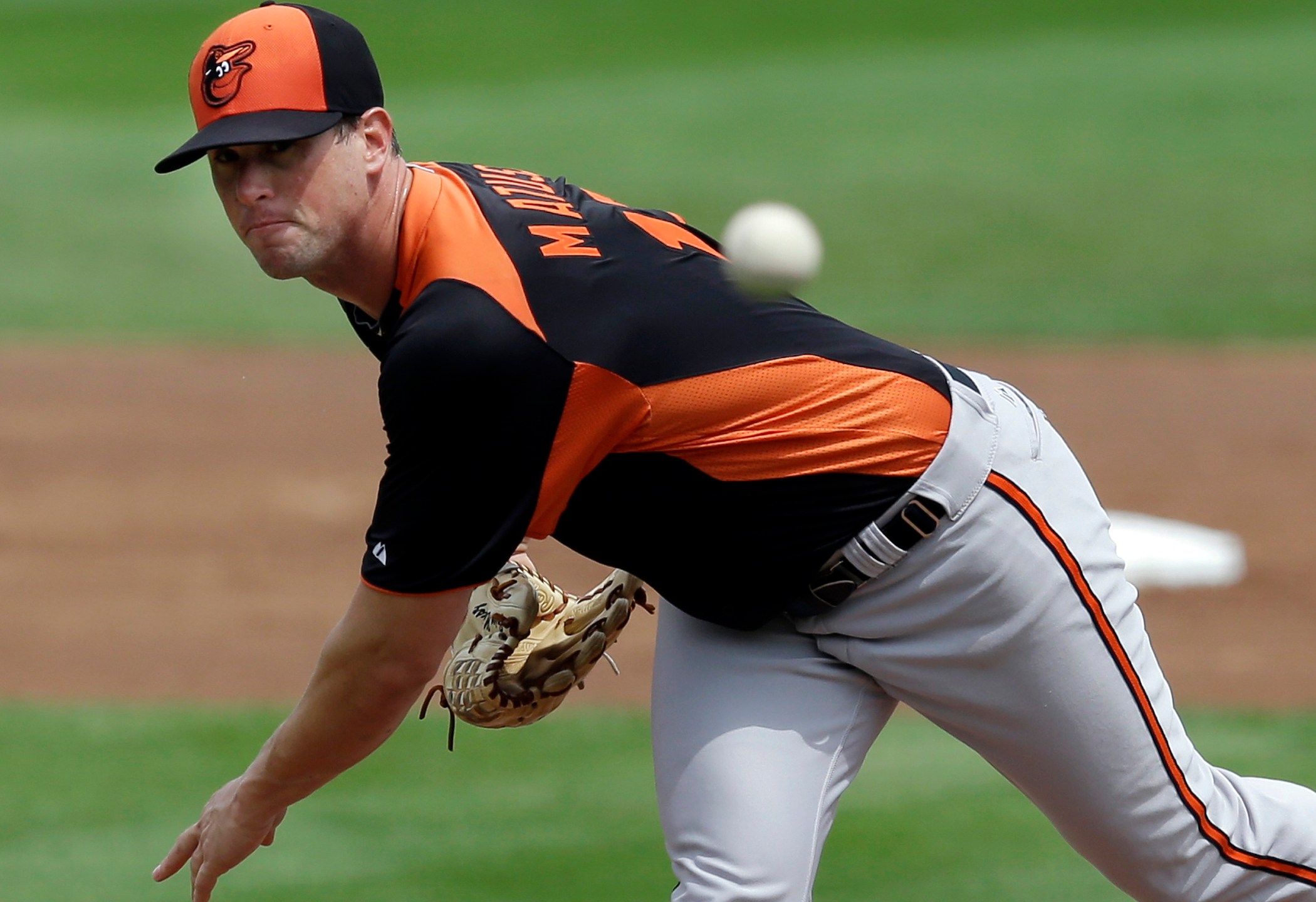 FILE - Baltimore Orioles starting pitcher Brian Matusz (17) delivers to the Boston Red Sox in the first inning of an exhibition spring training baseball game in Fort Myers, Fla., Tuesday, March 19, 2013. (AP Photo/Elise Amendola, File)