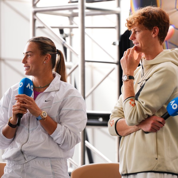 Defending champions Aryna Sabalenka and Jannik Sinner attend the official draw ceremony ahead of the Australian Open tennis championship in Melbourne, Australia, Thursday, Jan. 9, 2025. (AP Photo/Vincent Thian)