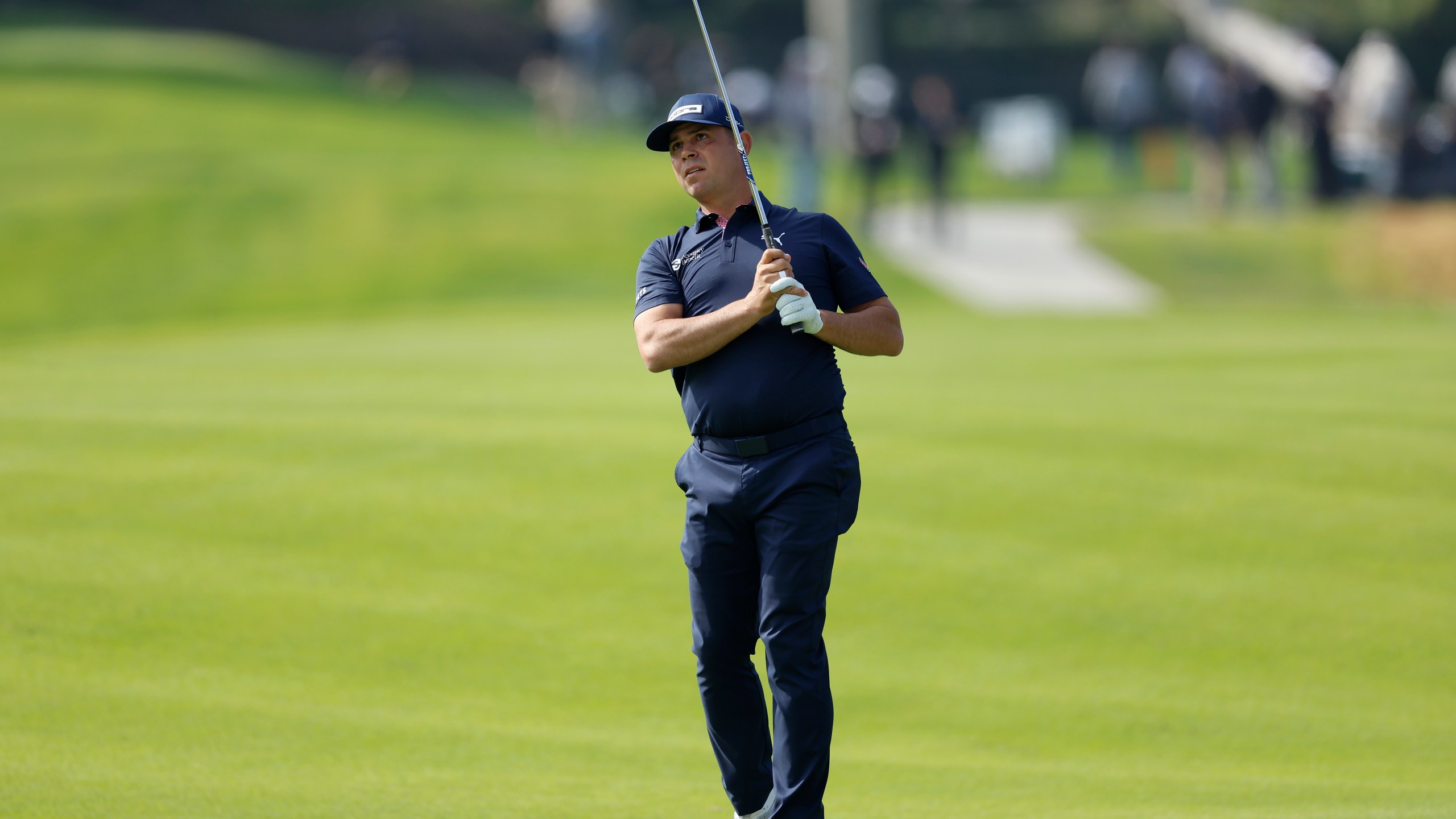 FILE - Gary Woodland hits from the seventh fairway during the first round of the Genesis Invitational golf tournament at Riviera Country Club, Thursday, Feb. 15, 2024, in the Pacific Palisades area of Los Angeles. (AP Photo/Ryan Kang, File)