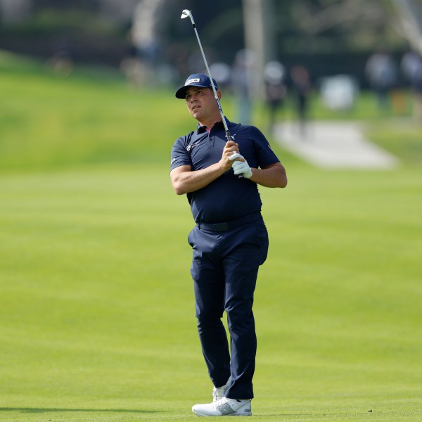 FILE - Gary Woodland hits from the seventh fairway during the first round of the Genesis Invitational golf tournament at Riviera Country Club, Thursday, Feb. 15, 2024, in the Pacific Palisades area of Los Angeles. (AP Photo/Ryan Kang, File)