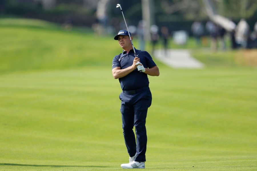 FILE - Gary Woodland hits from the seventh fairway during the first round of the Genesis Invitational golf tournament at Riviera Country Club, Thursday, Feb. 15, 2024, in the Pacific Palisades area of Los Angeles. (AP Photo/Ryan Kang, File)