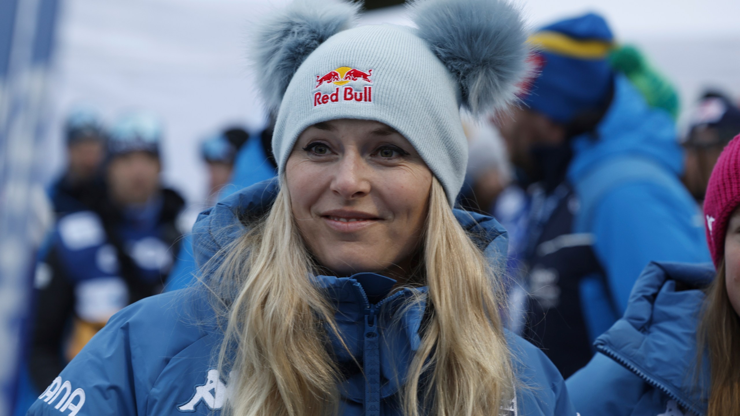 Alpine ski great United States Lindsey Vonn watches the 10km women's mass start race of the Tour de Ski cross country, in Val di Fiemme, Italy, Sunday, Jan. 5, 2025. (AP Photo/Alessandro Trovati)