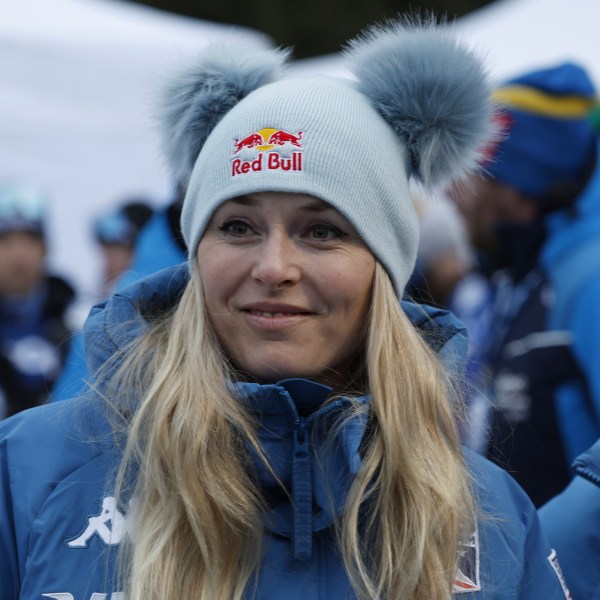 Alpine ski great United States Lindsey Vonn watches the 10km women's mass start race of the Tour de Ski cross country, in Val di Fiemme, Italy, Sunday, Jan. 5, 2025. (AP Photo/Alessandro Trovati)