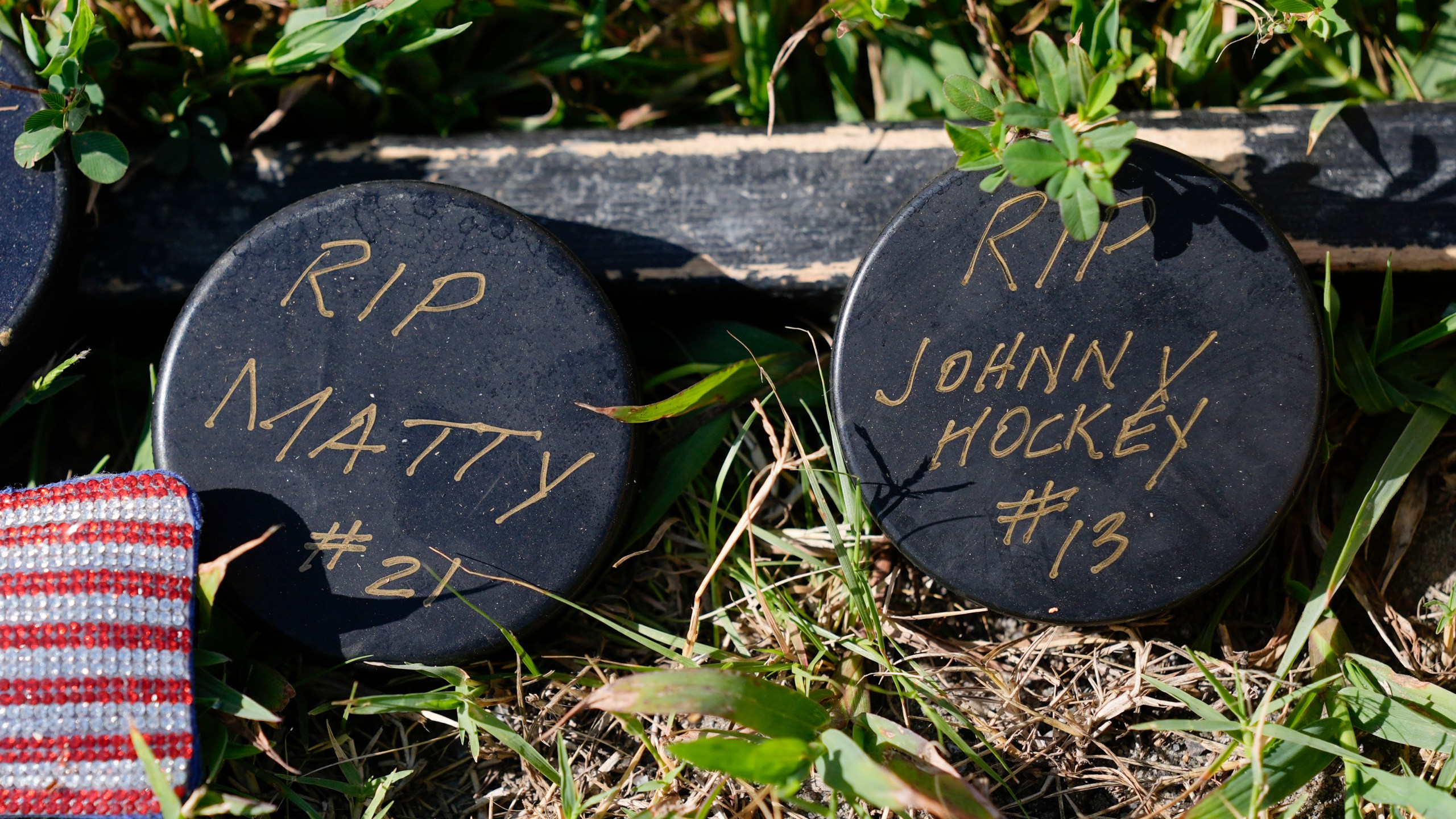 FILE - Shown is a makeshift memorial for NHL hockey player Johnny Gaudreau and his brother Matthew who were killed by a suspected drunken driver as they bicycled on a rural road, Sept. 5, 2024, in Oldmans Township , N.J. (AP Photo/Matt Rourke, file)