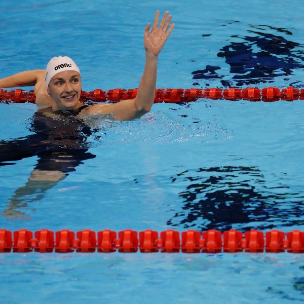 FILE - Hungary's Katinka Hosszu waves after winning a semifinal of the women's 200-meter backstroke during the swimming competitions at the 2016 Summer Olympics, Thursday, Aug. 11, 2016, in Rio de Janeiro, Brazil. (AP Photo/Natacha Pisarenko, File)