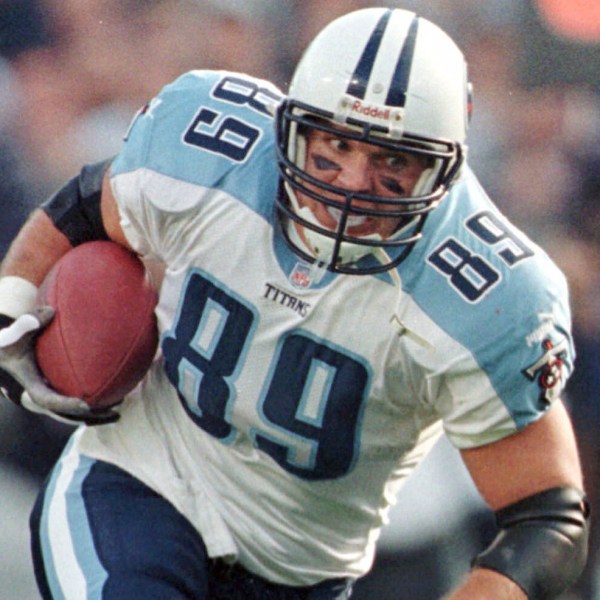 FILE - Tennessee Titans tight end Frank Wycheck runs with the ball during a football game against the Baltimore Ravens, Dec. 5, 1999, in Baltimore. (AP Photo/Roberto Borea, File)