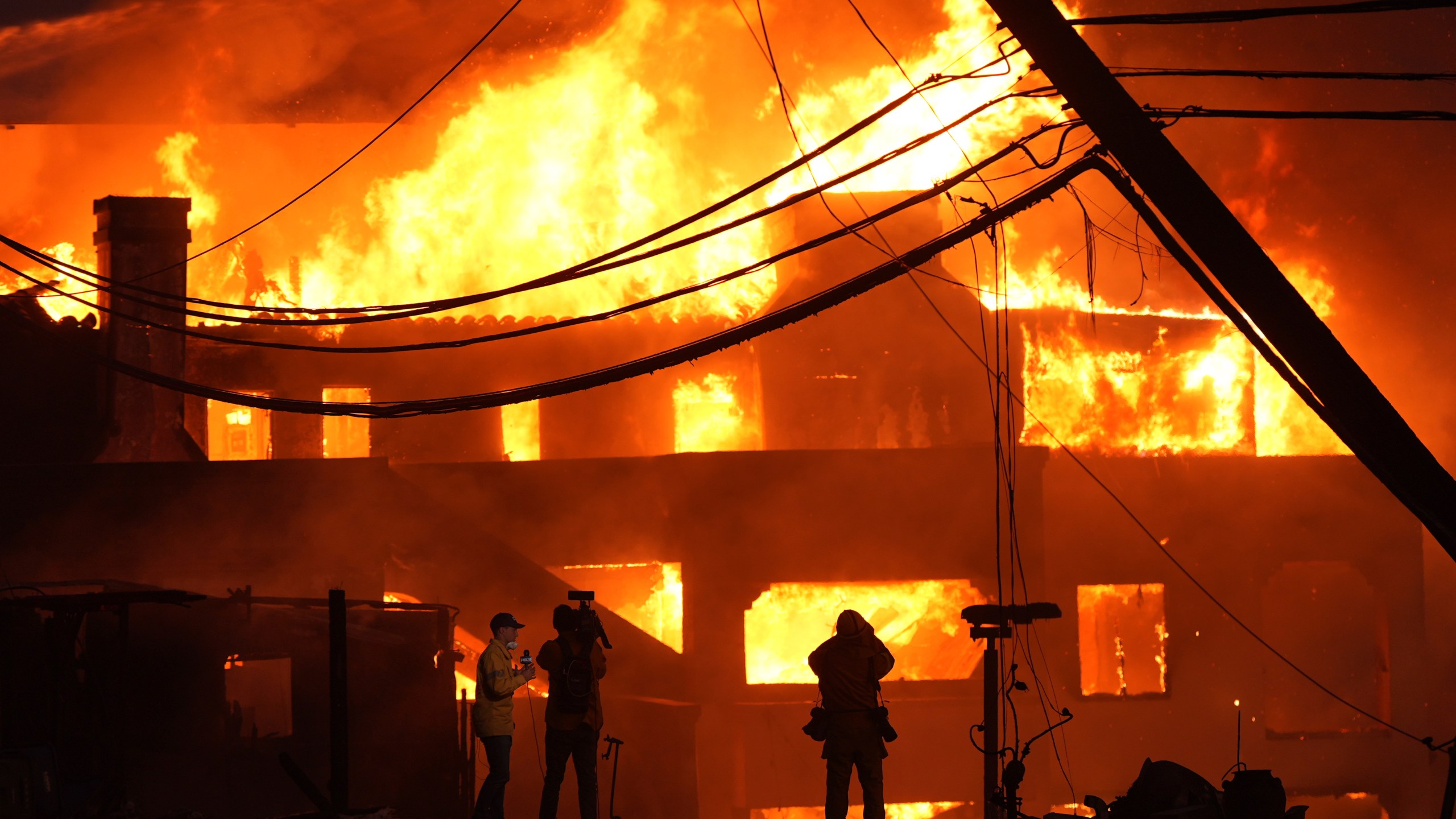 Beach front homes are destroyed by the Palisades Fire Wednesday, Jan. 8, 2025 in Malibu, Calif. (AP Photo/Mark J. Terrill)