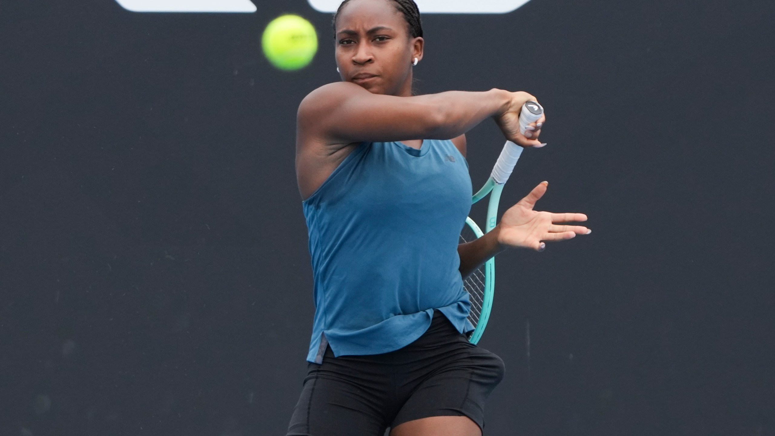 Coco Gauff of the United States plays a forehand return during a practice session ahead of the Australian Open tennis championship in Melbourne, Australia, Thursday, Jan. 9, 2025. (AP Photo/Mark Baker)