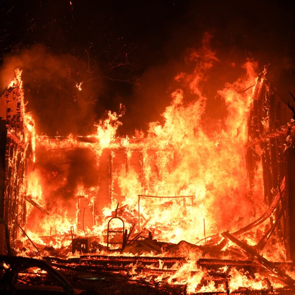 A structure is burned by the Palisades Fire in the Pacific Palisades neighborhood of Los Angeles, Thursday, Jan. 9, 2025. (AP Photo/Jae C. Hong)