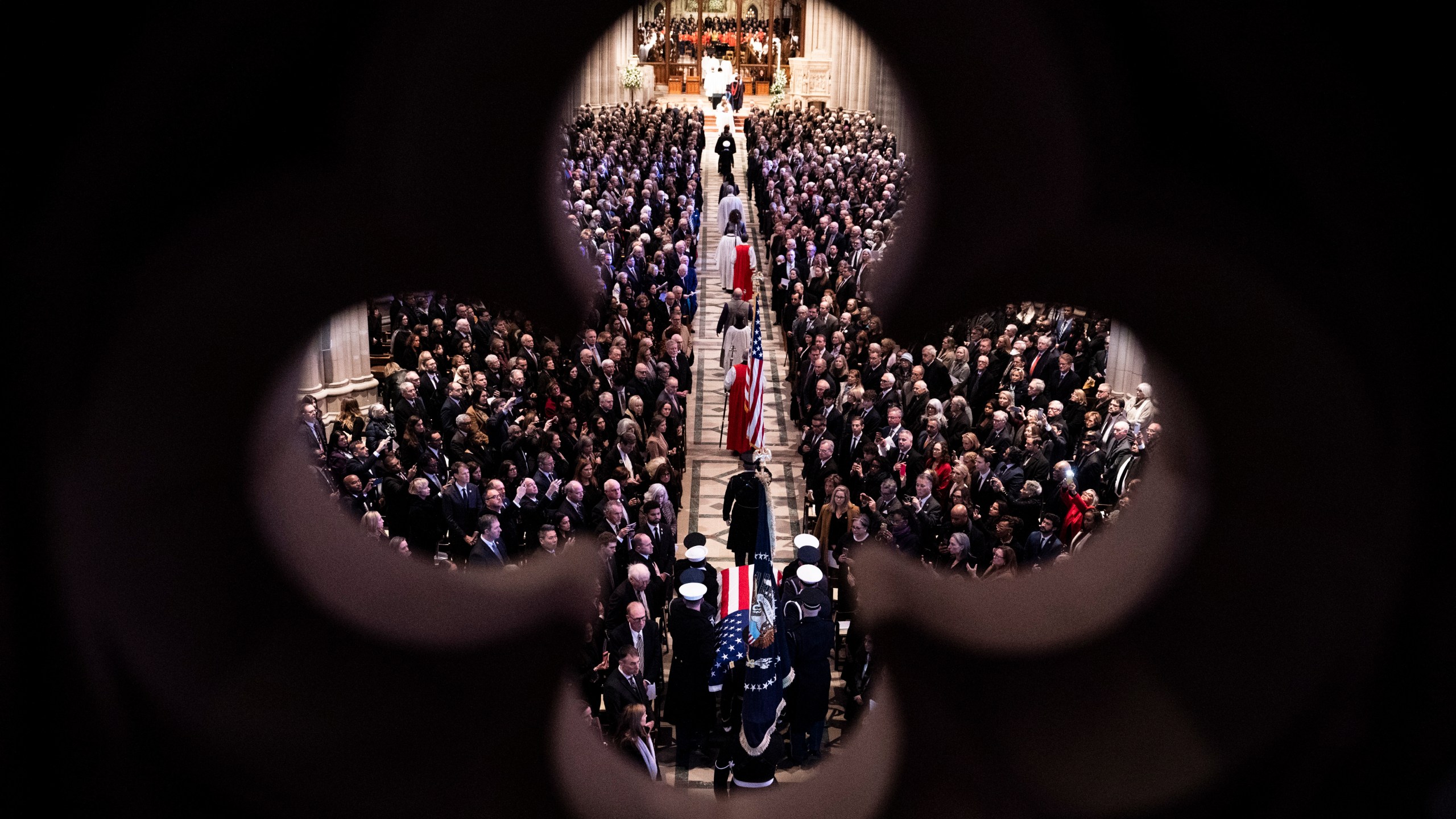 The casket of former President Jimmy Carter arrives for a state funeral at the National Cathedral, Thursday, Jan. 9, 2025, in Washington. (Haiyun Jiang/The New York Times via AP, Pool)