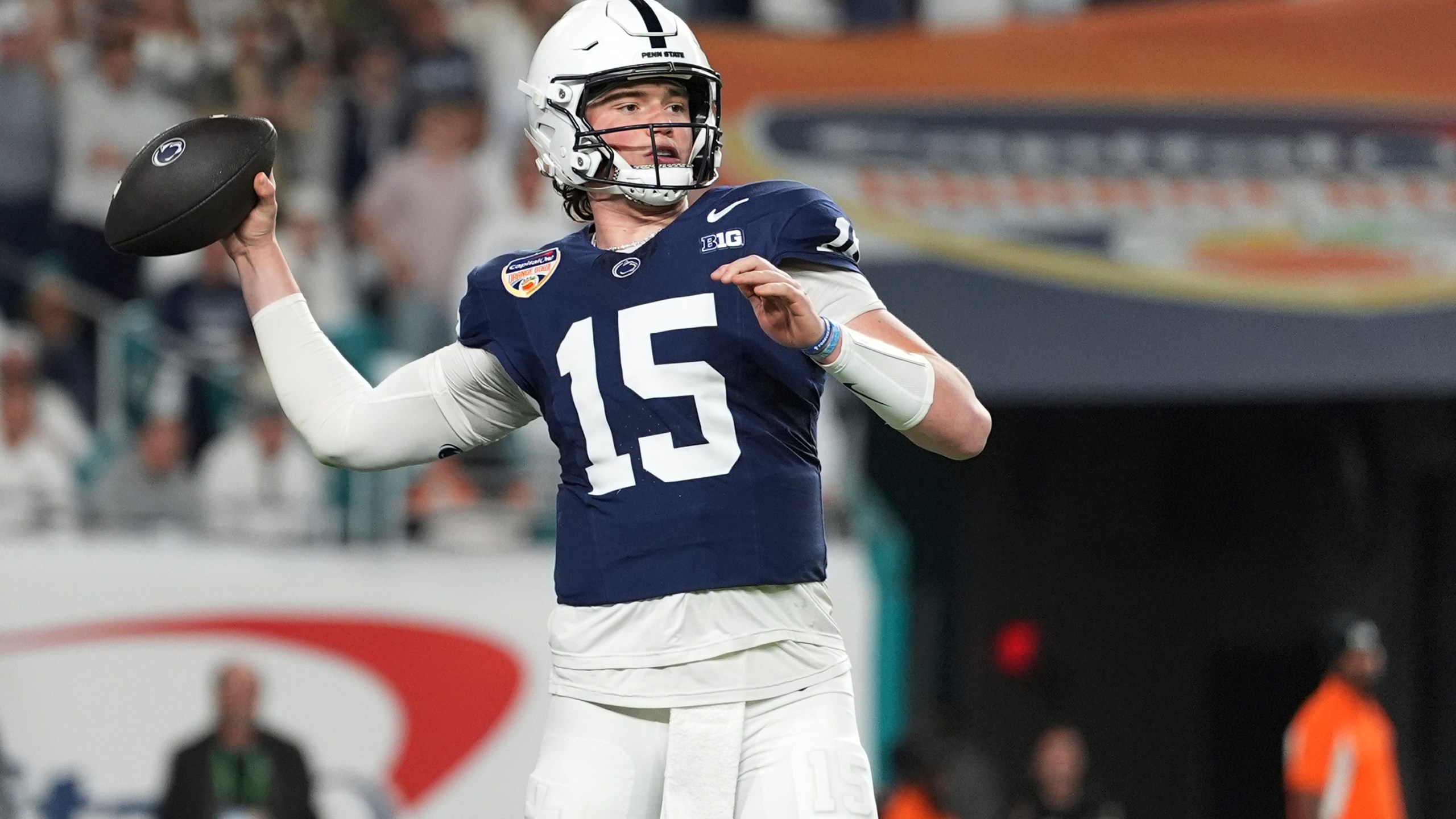 Penn State quarterback Drew Allar (15) throws for a touchdown during the first half of the Orange Bowl NCAA College Football Playoff semifinal game against Notre Dame, Thursday, Jan. 9, 2025, in Miami Gardens, Fla. (AP Photo/Rebecca Blackwell)