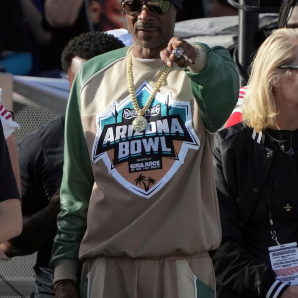 Snoop Dogg reacts after a play between Colorado State and Miami (Ohio) in the first half of the Arizona Bowl NCAA college football game, Saturday, Dec. 28, 2024, in Tucson, Ariz.