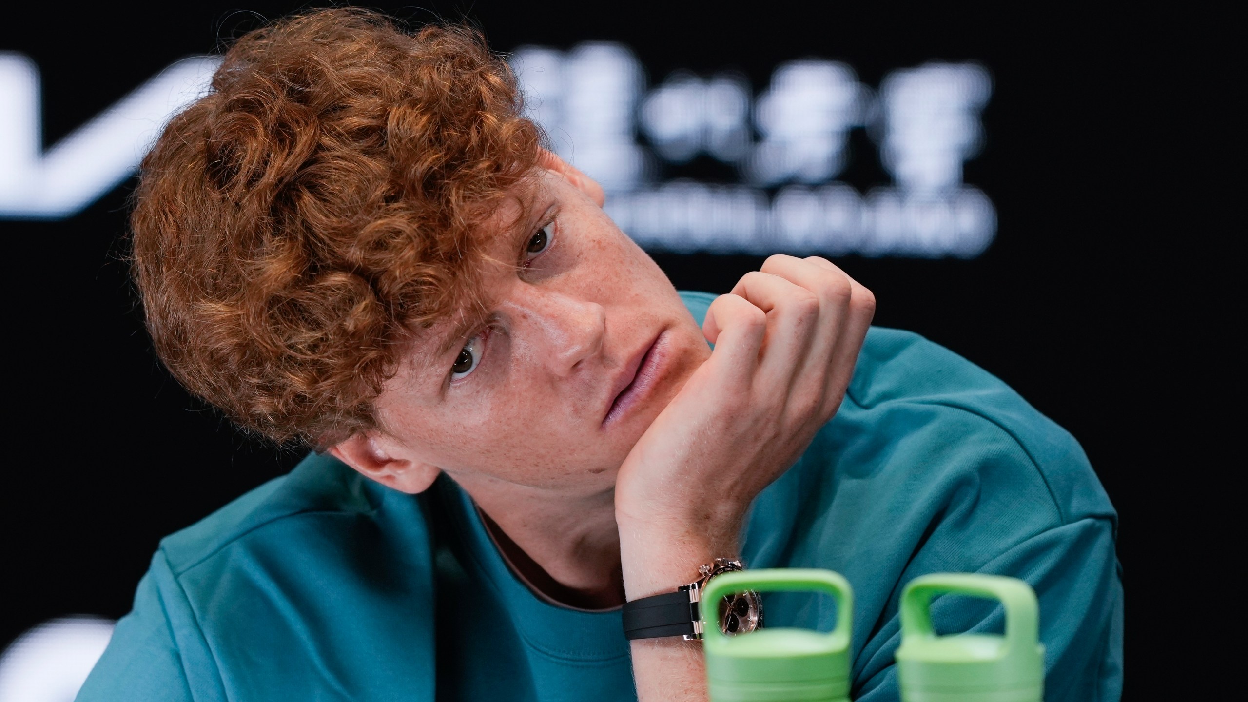 Italy's Jannik Sinner reacts during a press conference ahead of the Australian Open tennis championship in Melbourne, Australia, Friday, Jan. 10, 2025. (AP Photo/Ng Han Guan)