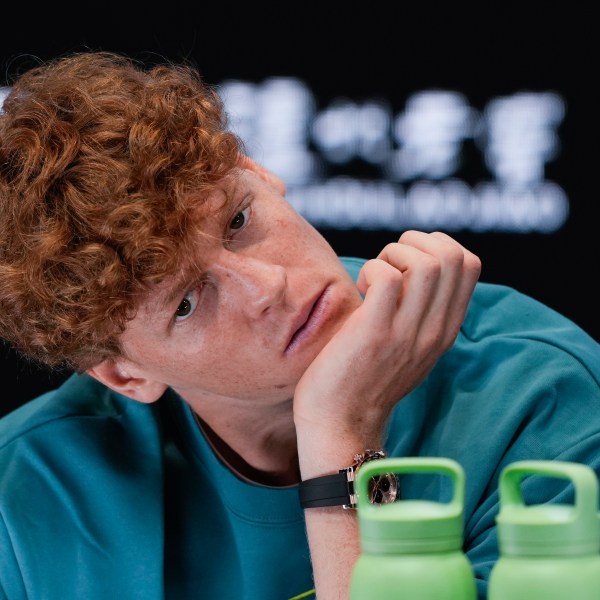 Italy's Jannik Sinner reacts during a press conference ahead of the Australian Open tennis championship in Melbourne, Australia, Friday, Jan. 10, 2025. (AP Photo/Ng Han Guan)