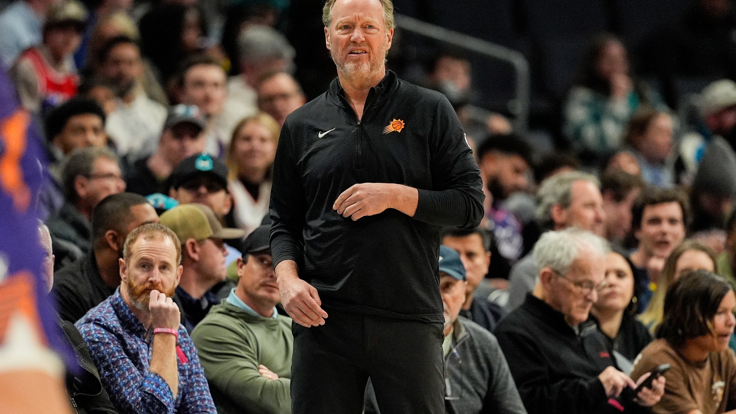 Phoenix Suns head coach Mike Budenholzer during the first half of an NBA basketball game against the Charlotte Hornets in Charlotte, N.C., Tuesday, Jan. 7, 2025. (AP Photo/Jim Dedmon)