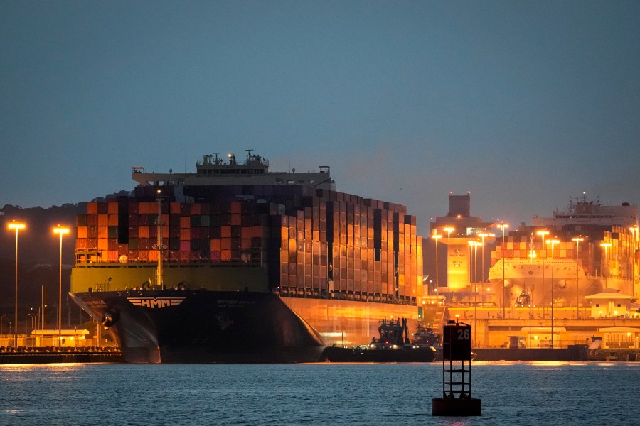 FILE - A cargo ship sails through the Miraflores locks of the Panama Canal, in Panama City, on Sept. 9, 2024. (AP Photo/Matias Delacroix, File)