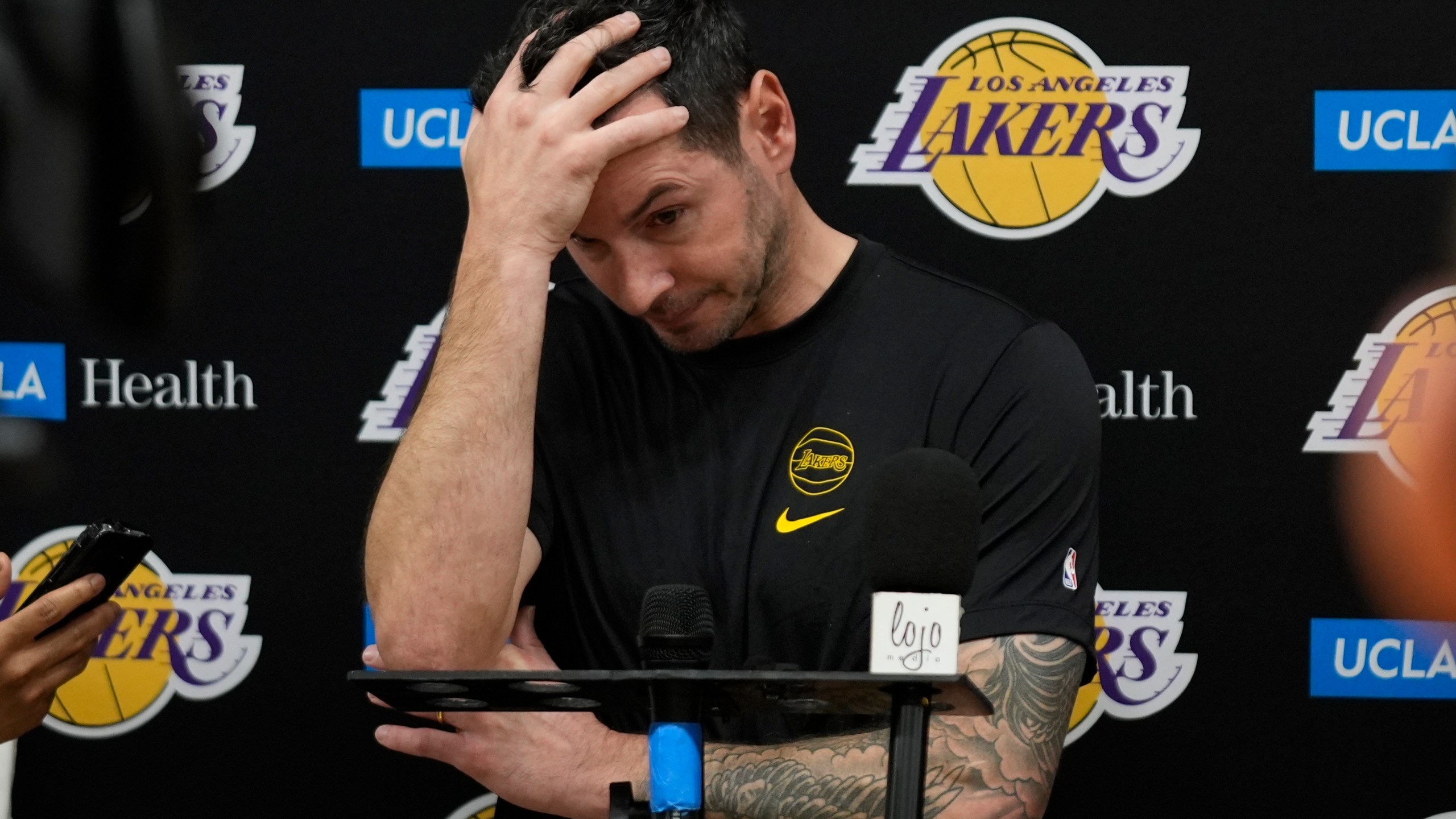 Los Angeles Lakers coach JJ Redick recounts that he and his family lost their house in the deadly Pacific Palisades wildfire during an NBA basketball news conference at the UCLA Health Training Center in El Segundo, Calif., Friday, Jan. 10, 2025. (AP Photo/Damian Dovarganes)