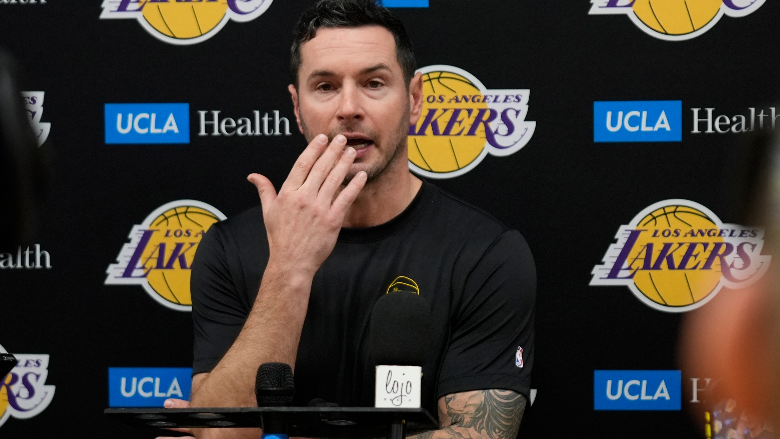 Los Angeles Lakers coach JJ Redick recounts that he and his family lost their house in the deadly Pacific Palisades wildfire during an NBA basketball news conference at the UCLA Health Training Center in El Segundo, Calif., Friday, Jan. 10, 2025. (AP Photo/Damian Dovarganes)