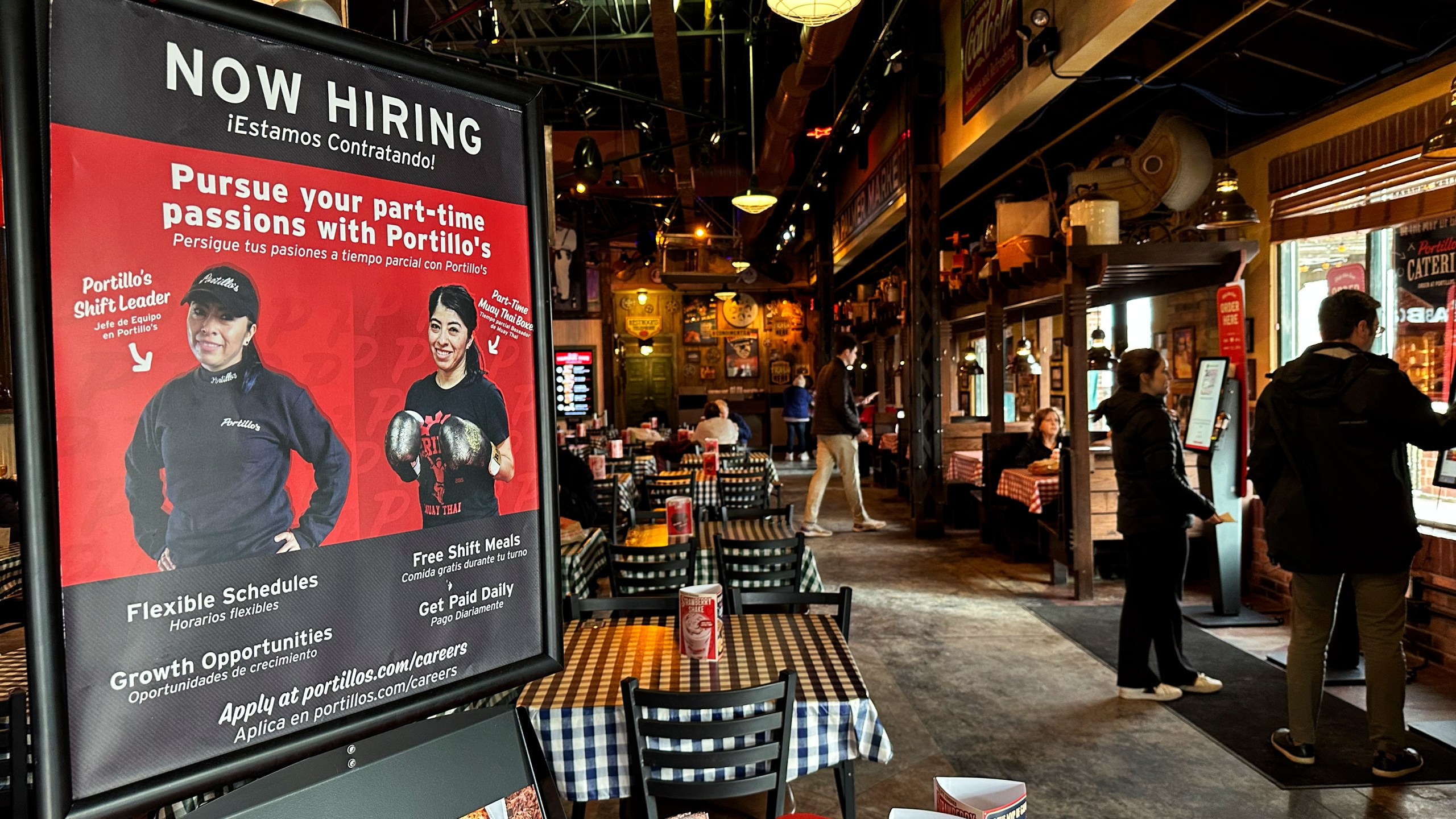 A hiring sign is displayed at a restaurant in Skokie, Ill., Wednesday, Jan. 8, 2025. (AP Photo/Nam Y. Huh)