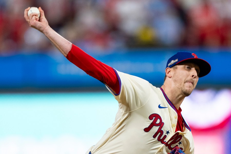 FILE - Philadelphia Phillies relief pitcher Jeff Hoffman delivers during Game 2 of a baseball NL Division Series against the New York Mets, Oct. 6, 2024, in Philadelphia. (AP Photo/Chris Szagola, File)