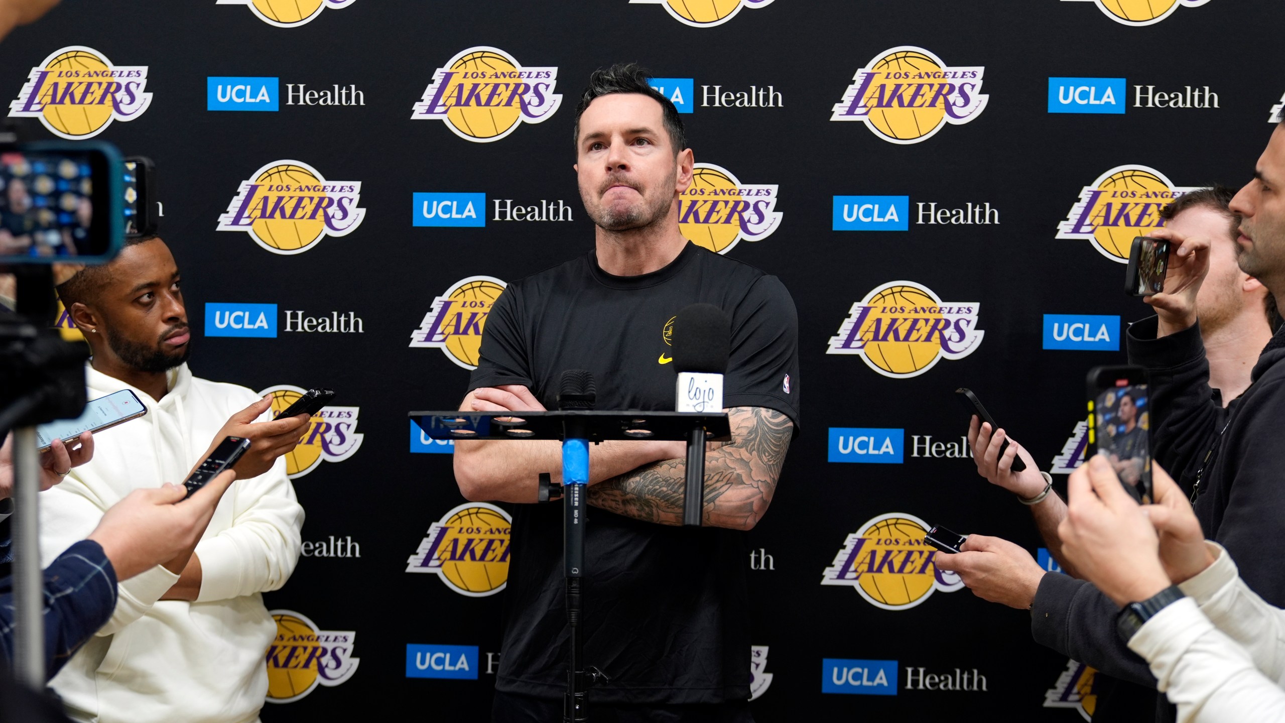 Los Angeles Lakers coach JJ Redick recounts that he and his family lost their house in the deadly Pacific Palisades wildfire during an NBA basketball news conference at the UCLA Health Training Center in El Segundo, Calif., Friday, Jan. 10, 2025. (AP Photo/Damian Dovarganes)