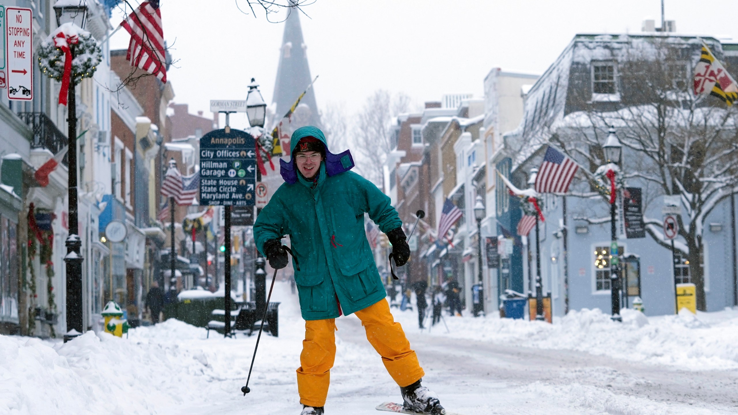 FILE - Cosimos Cendo, of Washington, D.C., skis down Main Street in Annapolis, Md., Jan. 6, 2025, during a snow storm. (AP Photo/Susan Walsh, File)