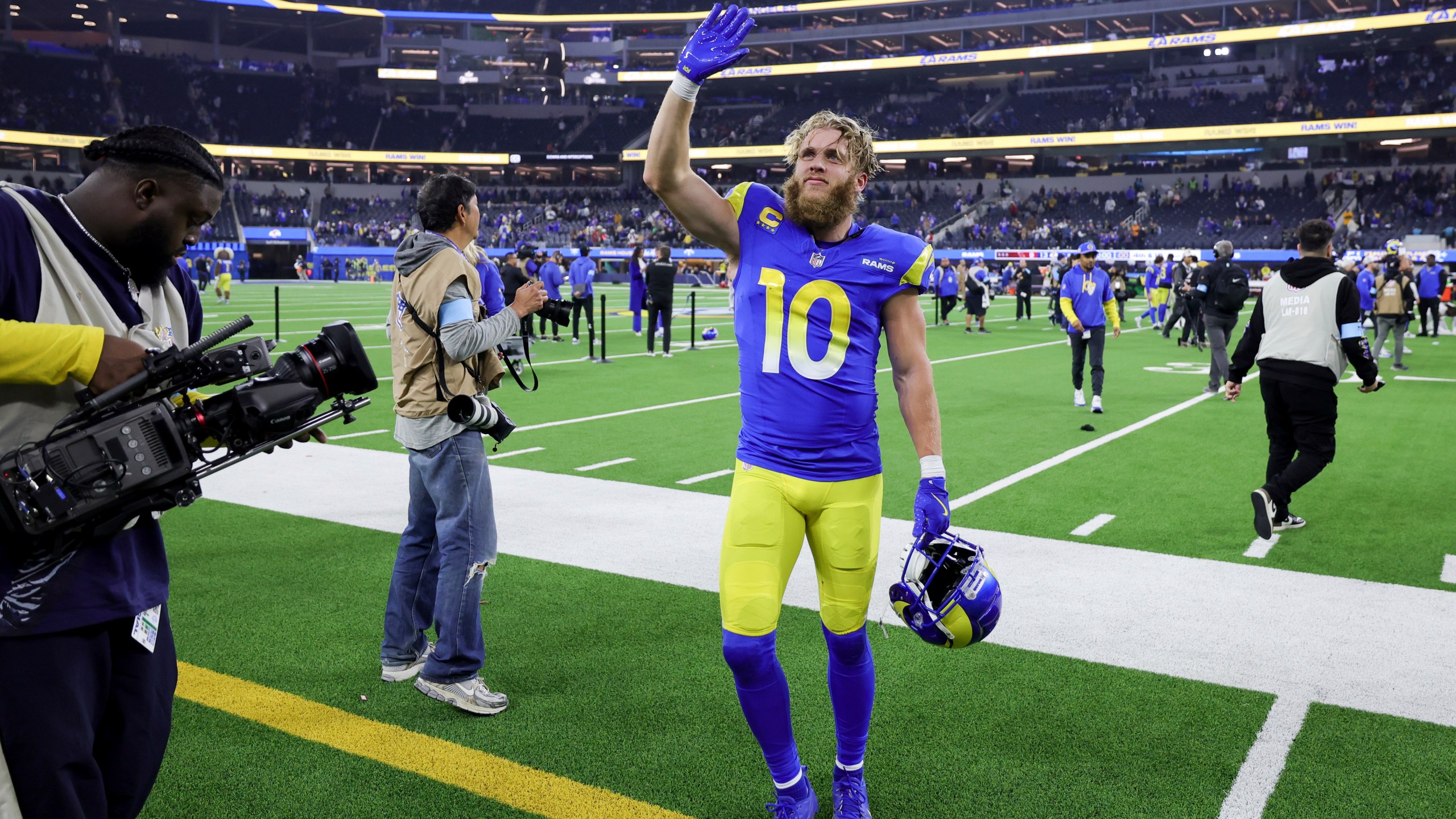 Los Angeles Rams wide receiver Cooper Kupp (10) waves as he leaves the field following a win over the Arizona Cardinals in an NFL football game Saturday, Dec. 28, 2024, in Inglewood, Calif. (AP Photo/Ryan Sun)