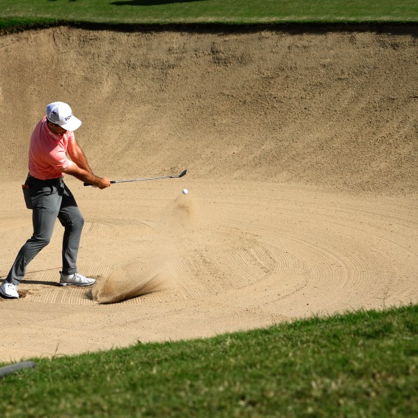 Denny McCarthy hits out of bunker on the 17th hole during the third round of the Sony Open golf tournament, Saturday, Jan. 11, 2025, at Waialae Country Club in Honolulu. (AP Photo/Matt York)