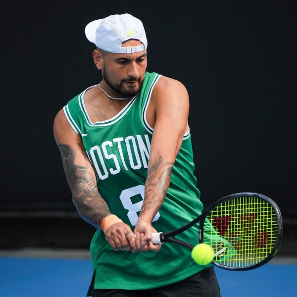 Australia's Nick Kyrgios plays a backhand return during a practice session ahead of the Australian Open tennis championship in Melbourne, Australia, Friday, Jan. 10, 2025. (AP Photo/Vincent Thian)