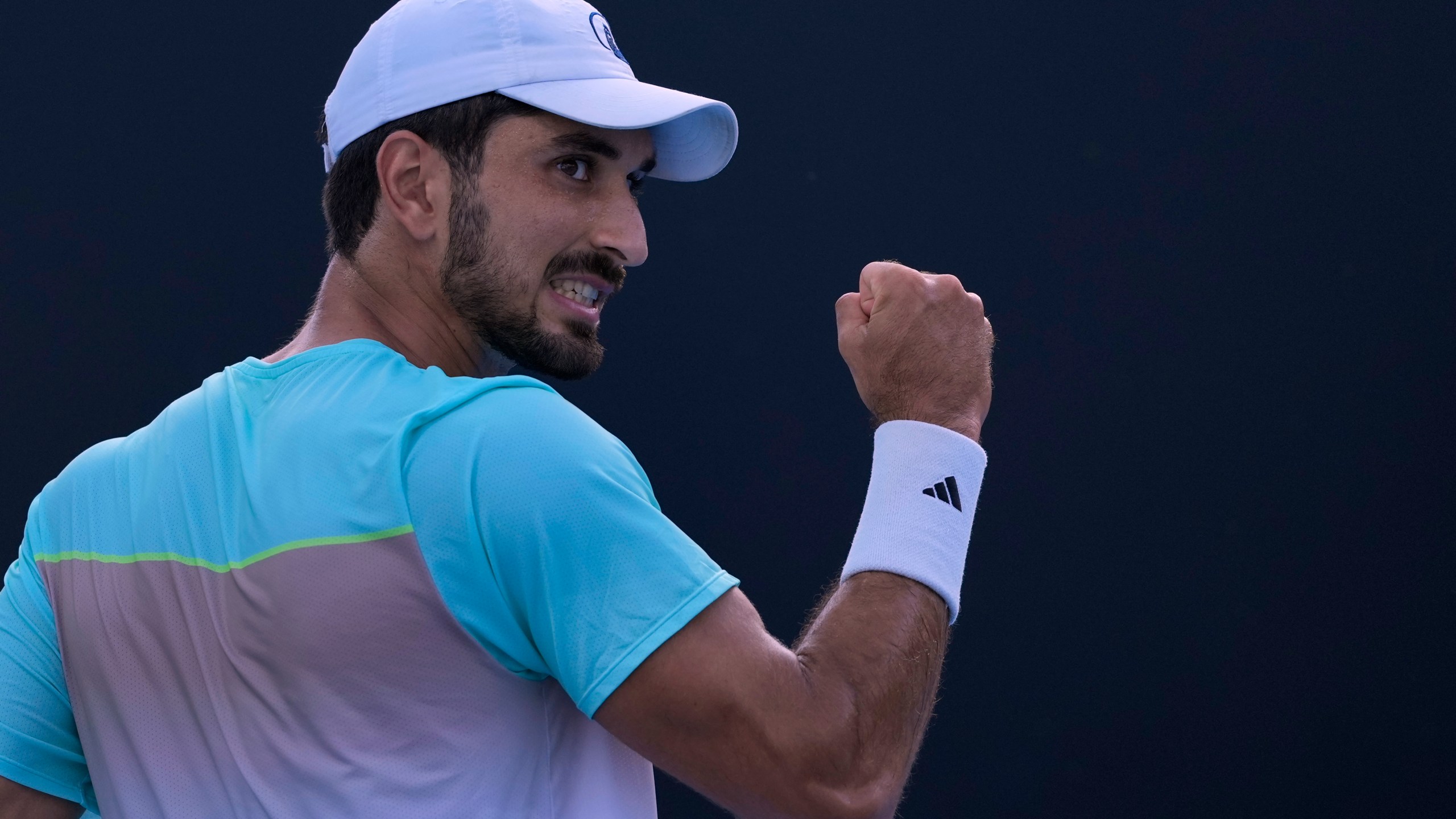 Hady Habib of Lebanon reacts after winning a point against Bu Yunchaokete of China during their first round match at the Australian Open tennis championship in Melbourne, Australia, Sunday, Jan. 12, 2025. (AP Photo/Asanka Brendon Ratnayake)