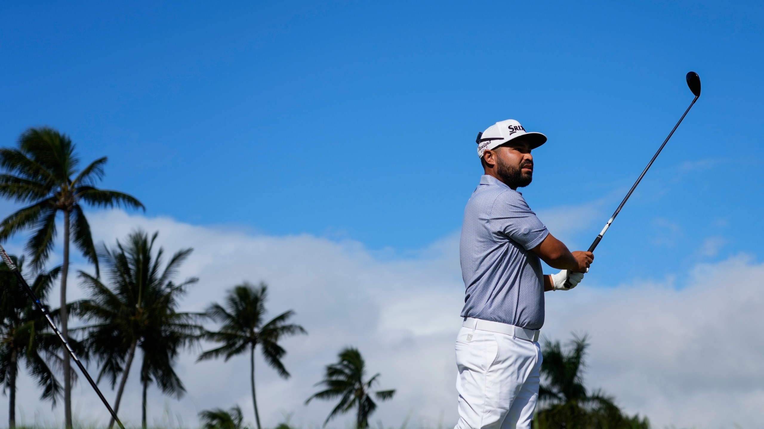 J.J. Spaun hits from the second teeduring the final round of the Sony Open golf event, Sunday, Jan. 12, 2025, at Waialae Country Club in Honolulu. (AP Photo/Matt York)