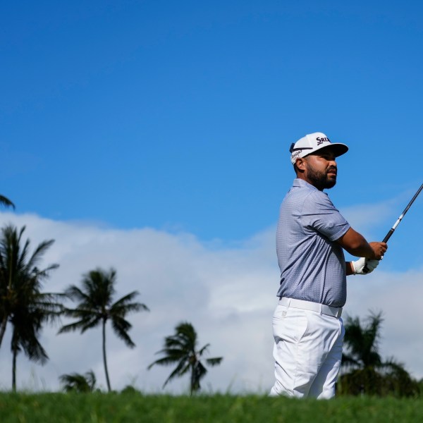 J.J. Spaun hits from the second teeduring the final round of the Sony Open golf event, Sunday, Jan. 12, 2025, at Waialae Country Club in Honolulu. (AP Photo/Matt York)