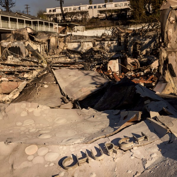 The Altadena Community Church is left damaged by the Eaton Fire Sunday, Jan. 12, 2025 in Altadena, Calif. (AP Photo/Ethan Swope)