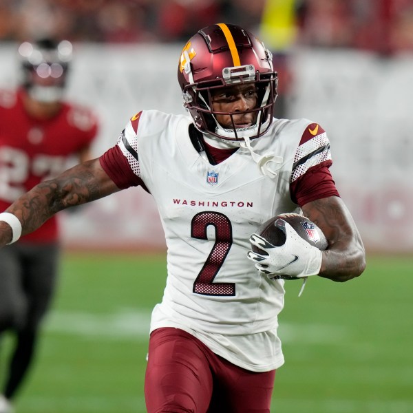 Washington Commanders wide receiver Dyami Brown (2) runs against the Tampa Bay Buccaneers during the second half of an NFL wild-card playoff football game in Tampa, Fla., Sunday, Jan. 12, 2025. (AP Photo/Chris O'Meara)