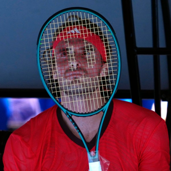 Stefanos Tsitsipas of Greece reacts during a break in his first round match against Alex Michelsen of the U.S. at the Australian Open tennis championship in Melbourne, Australia, Monday, Jan. 13, 2025. (AP Photo/Ng Han Guan)