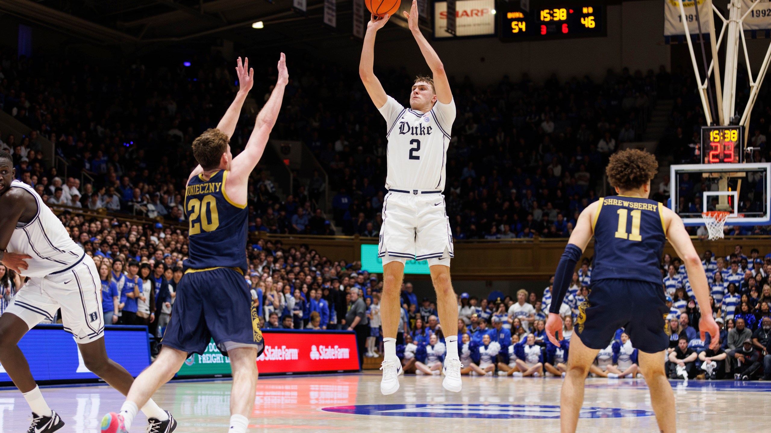 Duke's Cooper Flagg (2) attempts a shot over Notre Dame's J.R. Konieczny (20) during the second half of an NCAA college basketball game in Durham, N.C., Saturday, Jan. 11, 2025. (AP Photo/Ben McKeown)