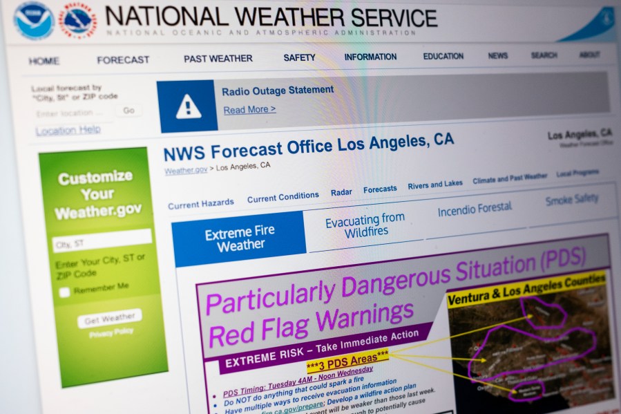 A "Particularly Dangerous Situation" red flag warning appears on the National Weather Service's website for Los Angeles due to the extreme risk of wildfires in the region, Monday, Jan. 13, 2025. (AP Photo/Rachel Leathe)