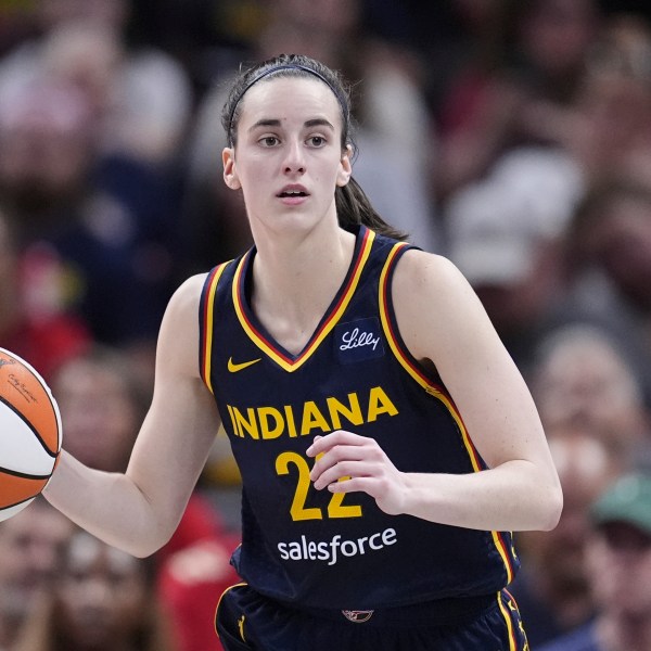 FILE - Indiana Fever guard Caitlin Clark (22) plays against the Dallas Wings in the second half of a WNBA basketball game in Indianapolis, Sept. 15, 2024. (AP Photo/Michael Conroy, File)