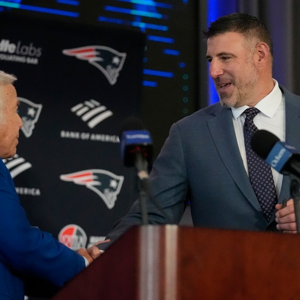 New England Patriots head coach Mike Vrabel, right, shakes hands with team owner Robert Kraft while being introduced during an availability, Monday, Jan. 13, 2025, in Foxborough, Mass. (AP Photo/Charles Krupa)