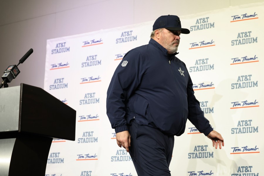 Dallas Cowboys head coach Mike McCarthy talks to reporters following an NFL football game against the Washington Commanders, Sunday, Jan. 5, 2025, in Arlington, Texas. The Commanders won 23-19. (AP Photo/Gareth Patterson)