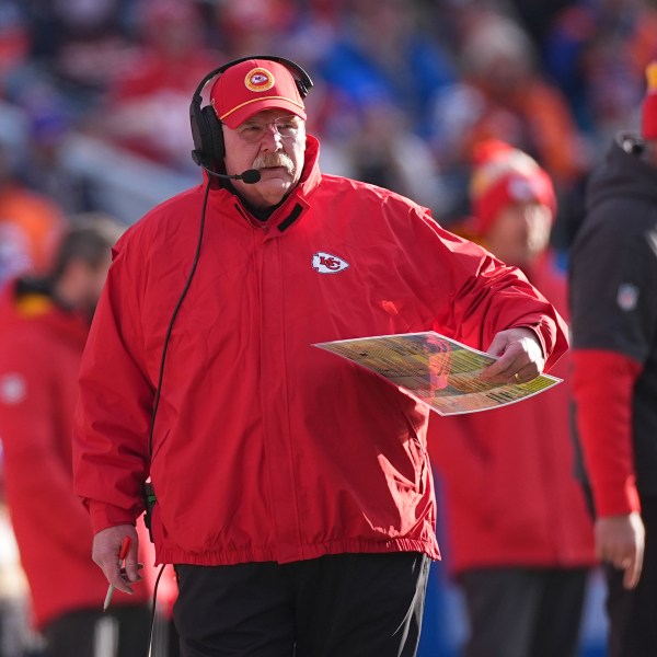 Kansas City Chiefs head coach Andy Reid watches from the sidelines during the first half of an NFL football game against the Denver Broncos Sunday, Jan. 5, 2025, in Denver. (AP Photo/David Zalubowski)