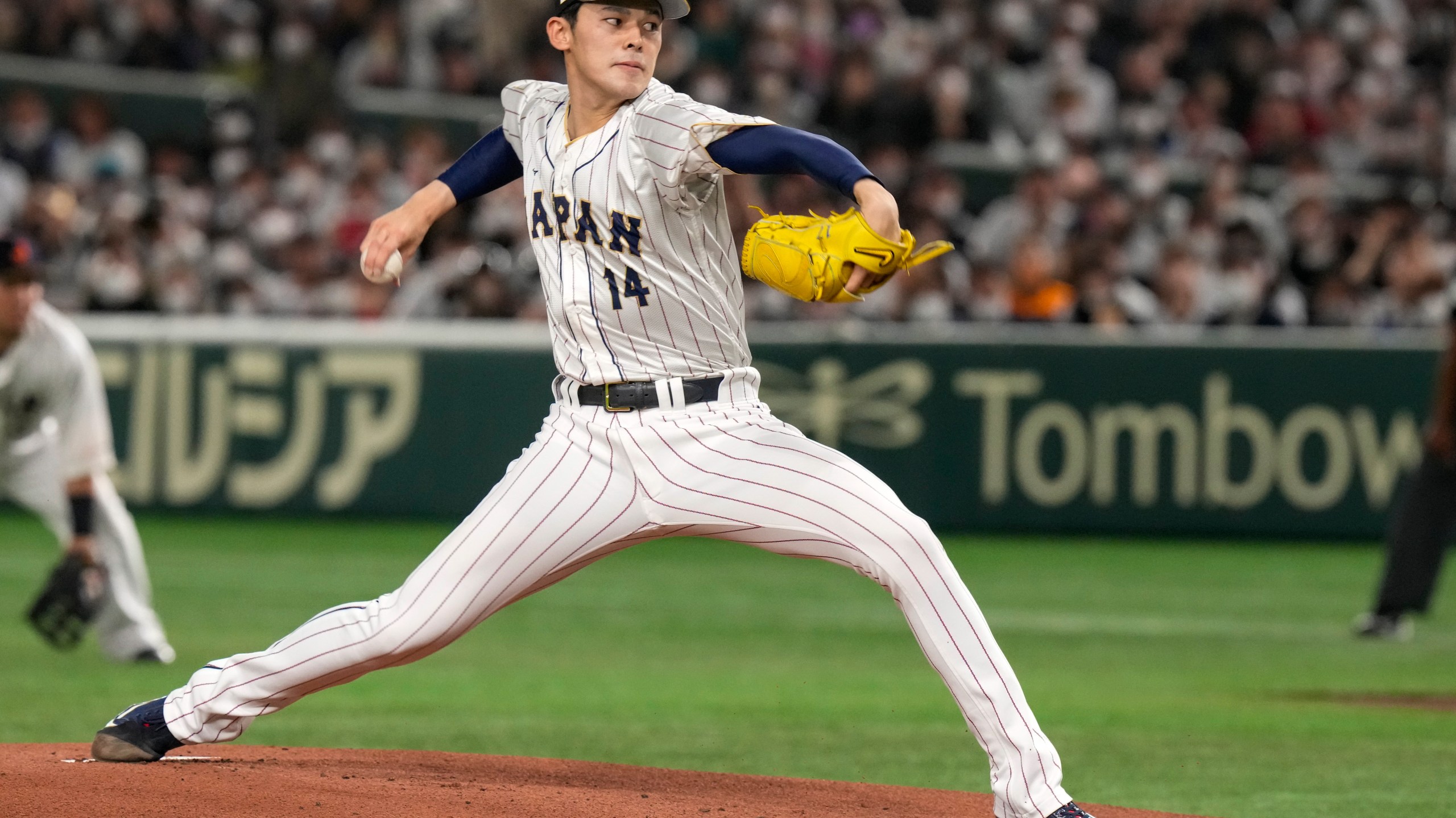 FILE - Japan's Roki Sasak pitches during a Pool B game against the Czech Republic at the World Baseball Classic at the Tokyo Dome, Japan, Saturday, March 11, 2023. (AP Photo/Eugene Hoshiko, File)