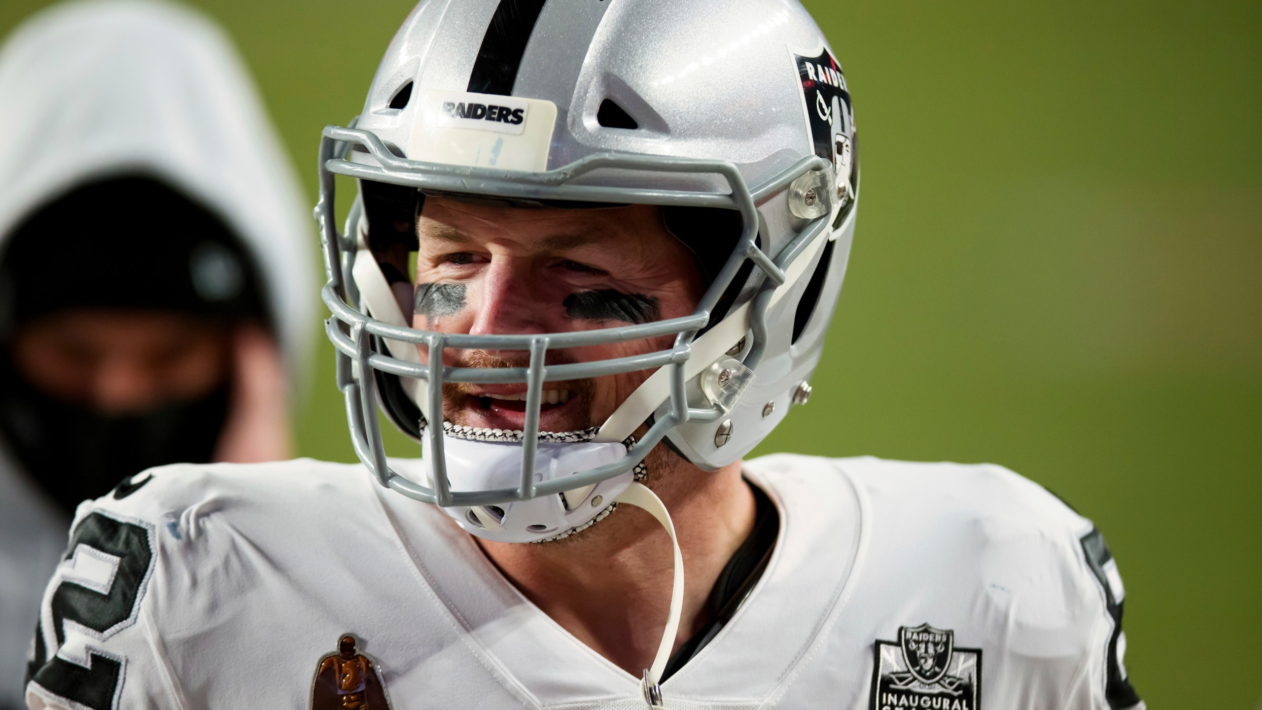 FILE - Las Vegas Raiders tight end Jason Witten (82) smiles as he walks off the field after a 32-31 win against the Denver Broncos in an NFL football game, Sunday, Jan.. 3, 2021, in Denver. (AP Photo/Justin Edmonds, file)