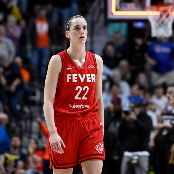 FILE - Indiana Fever guard Caitlin Clark (22) walks off the court after the Fever were eliminated by the Connecticut Sun in an WNBA basketball playoff game, Sept. 25, 2024, in Uncasville, Conn. (AP Photo/Jessica Hill, File)